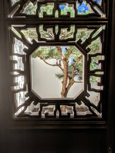 Landscape framed in intricate window. Breathtaking!