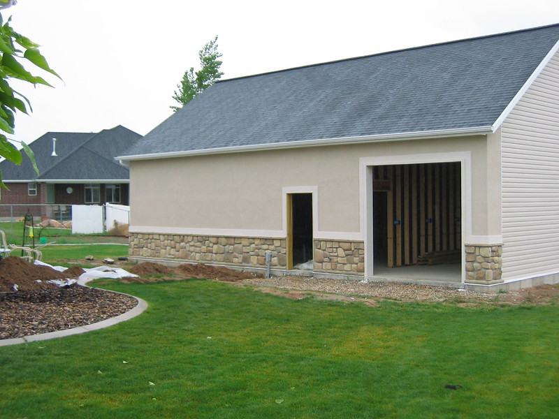 Shop with rock and stucco complete